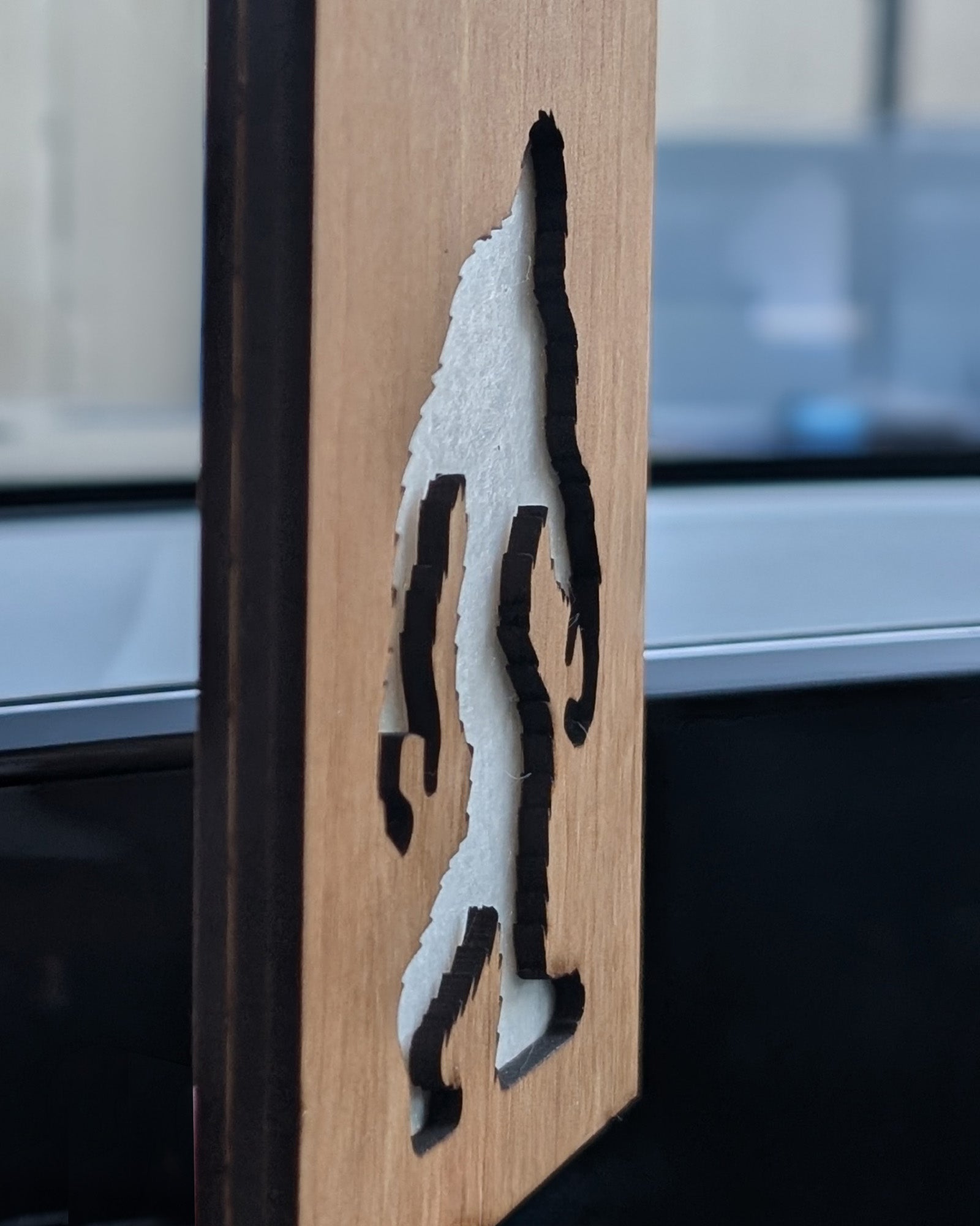 Wooden air freshener made from Baltic birch featuring a Bigfoot silhouette with a felt insert for scent.